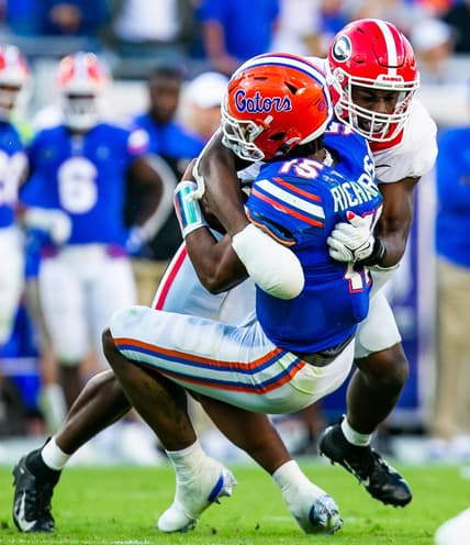 Georgia Bulldogs linebacker Nakobe Dean (17) sacks Florida Gators quarterback Anthony Richardson (15) in the second half. The Florida Gators lost to the Georgia Bulldogs 34-7, Saturday afternoon, October 30, 2021 at TIAA Bank Field in Jacksonville, FL. [Doug Engle/Gainesville Sun]2021

Flgai 103021 Bulldogsvsgators