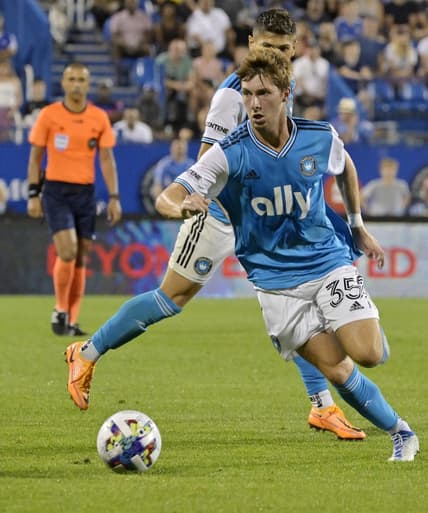 Jun 25, 2022; Montreal, Quebec, CAN; Charlotte FC  midfielder Quinn McNeill (35) plays the ball during the second half against CF Montreal at Stade Saputo. Mandatory Credit: Eric Bolte-USA TODAY Sports