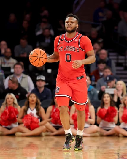 Mar 9, 2023; New York, NY, USA; St. John's Red Storm guard Posh Alexander (0) brings the ball up court against the Marquette Golden Eagles during the first half at Madison Square Garden. Mandatory Credit: Brad Penner-USA TODAY Sports