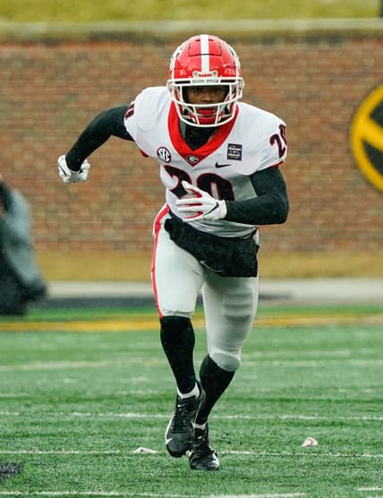 Dec 12, 2020; Columbia, Missouri, USA; Georgia Bulldogs defensive back Major Burns (20) defends against the Missouri Tigers during the second half at Faurot Field at Memorial Stadium. Mandatory Credit: Jay Biggerstaff-USA TODAY Sports