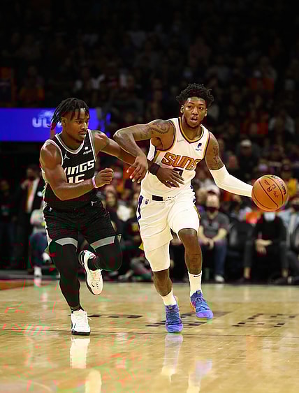 Oct 27, 2021; Phoenix, Arizona, USA; Phoenix Suns guard Elfrid Payton (2) controls the ball against Sacramento Kings guard Davion Mitchell (15) in the first half at Footprint Center. Mandatory Credit: Mark J. Rebilas-USA TODAY Sports