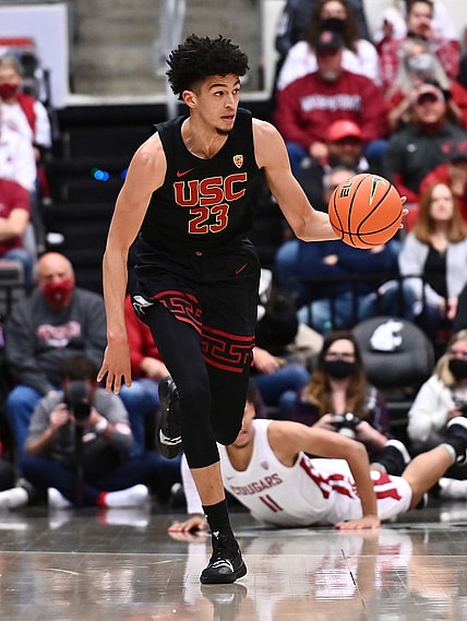 Dec 4, 2021; Pullman, Washington, USA; USC Trojans forward Max Agbonkpolo (23) brings the ball down court against the Washington State Cougars in the second half at Friel Court at Beasley Coliseum. USC won 63-61. Mandatory Credit: James Snook-USA TODAY Sports