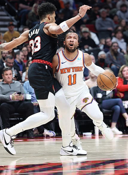 Mar 14, 2024; Portland, Oregon, USA; New York Knicks guard Jalen Brunson (11) reacts after being fouled by Portland Trail Blazers forward Toumani Camara (33) in the third quarter at Moda Center. Mandatory Credit: Jaime Valdez-USA TODAY Sports