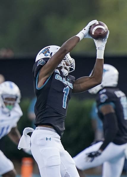 Sep 2, 2021; Conway, South Carolina, USA; Coastal Carolina Chanticleers running back Braydon Bennett (1) catches a pass against the Citadel Bulldogs during the first half at Brooks Stadium. Mandatory Credit: David Yeazell-USA TODAY Sports