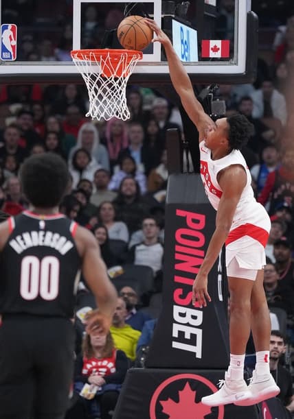 Oct 30, 2023; Toronto, Ontario, CAN; Toronto Raptors forward Scottie Barnes (4) scores a basket against the Portland Trail Blazers during the first quarter at Scotiabank Arena. Mandatory Credit: Nick Turchiaro-USA TODAY Sports