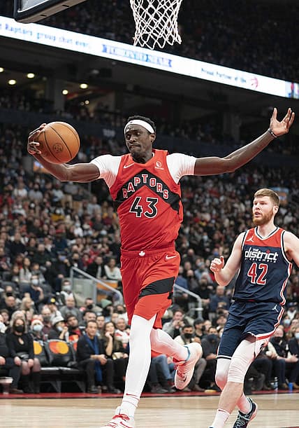 Dec 5, 2021; Toronto, Ontario, CAN Toronto Raptors forward Pascal Siakam (43) tries to control the ball during the third quarter against the Washington Wizards at Scotiabank Arena. Mandatory Credit: Nick Turchiaro-USA TODAY Sports