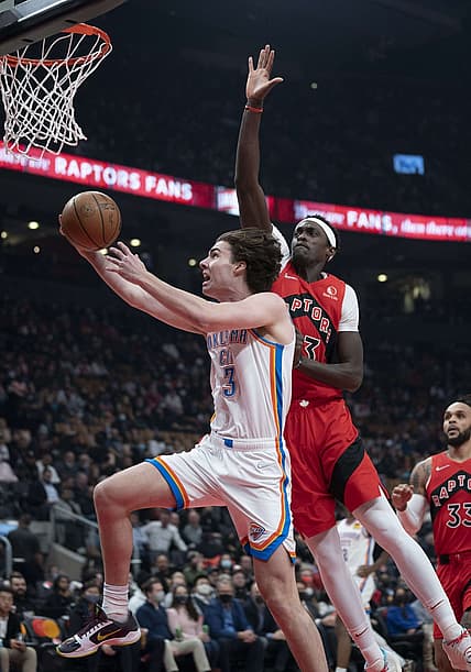 Dec 8, 2021; Toronto, Ontario, CAN; Oklahoma City Thunder guard Josh Giddey (3) drives to the basket as Toronto Raptors forward Pascal Siakam (43) tries to defend during the first quarter at Scotiabank Arena. Mandatory Credit: Nick Turchiaro-USA TODAY Sports