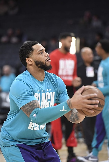 Feb 7, 2024; Charlotte, North Carolina, USA; Charlotte Hornets forward Miles Bridges (0) warms up before the game against the Toronto Raptors at the Spectrum Center. Mandatory Credit: Sam Sharpe-USA TODAY Sports