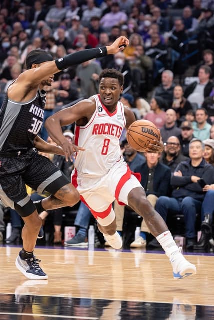 Jan 11, 2023; Sacramento, California, USA; Houston Rockets forward Jae'Sean Tate (8) drives to the basket against Sacramento Kings forward KZ Okpala (30) during the first quarter at Golden 1 Center. Mandatory Credit: Ed Szczepanski-USA TODAY Sports
