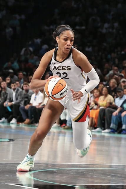 Aug 6, 2023; Brooklyn, New York, USA; Las Vegas Aces forward A'ja Wilson (22) drives to the basket in the third quarter against the New York Liberty at Barclays Center. Mandatory Credit: Wendell Cruz-USA TODAY Sports