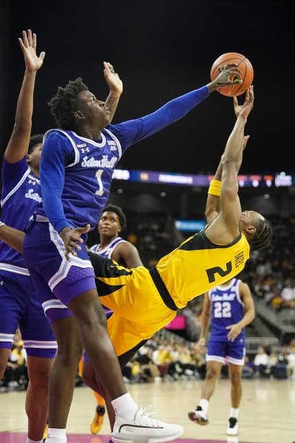 Dec 17, 2023; Kansas City, Missouri, USA; Missouri Tigers guard Tamar Bates (2) shoots as Seton Hall Pirates guard Kadary Richmond (1) tries to block during the first half at T-Mobile Center. Mandatory Credit: Denny Medley-USA TODAY Sports