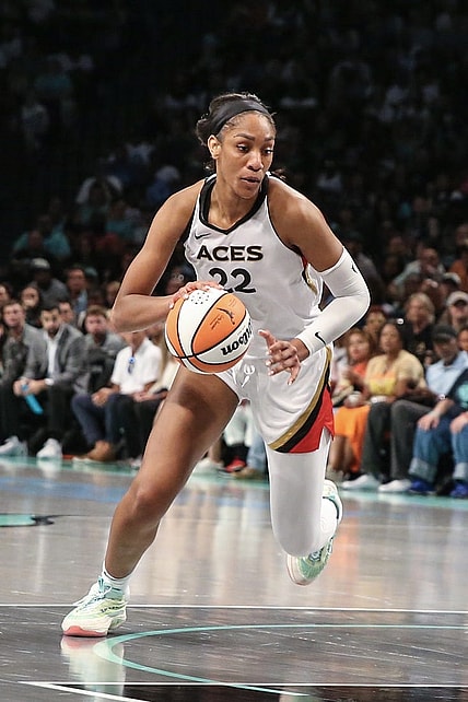 Aug 6, 2023; Brooklyn, New York, USA; Las Vegas Aces forward A'ja Wilson (22) drives to the basket in the third quarter against the New York Liberty at Barclays Center. Mandatory Credit: Wendell Cruz-USA TODAY Sports