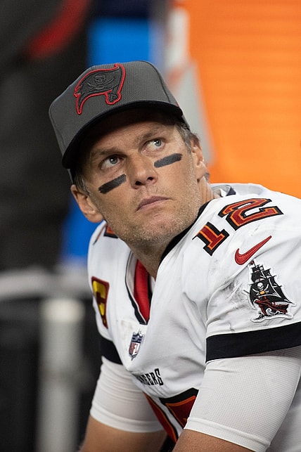 Nov 28, 2021; Indianapolis, Indiana, USA; Tampa Bay Buccaneers quarterback Tom Brady (12) on the sideline in the first half against the Indianapolis Colts at Lucas Oil Stadium. Mandatory Credit: Trevor Ruszkowski-USA TODAY Sports