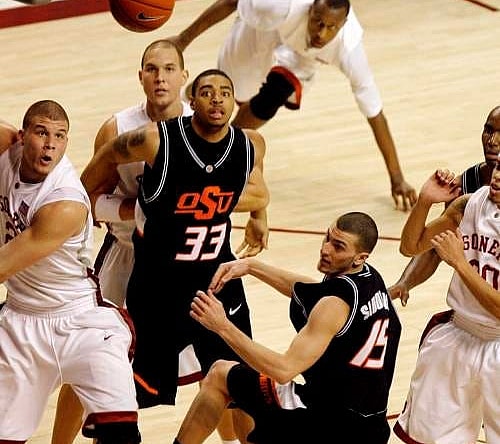 From left, OU's Blake Griffin, OU's Taylor Griffin, OSU's Marshall Moses (33) OSU's Nick Sidorakis, OSU's Marcus Dove and OU's Austin Johnson (20) go after a rebound in the first half during the men's Bedlam basketball game between Oklahoma State University and the University of Oklahoma at Lloyd Noble Center in Norman, Okla., Monday, January 28, 2008. BY MATT STRASEN, THE OKLAHOMAN ORG XMIT: KOD