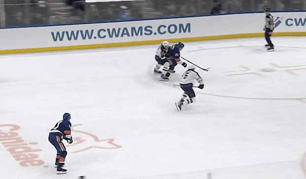 New York Islanders forward Kyle Palmieri cutting to the net.