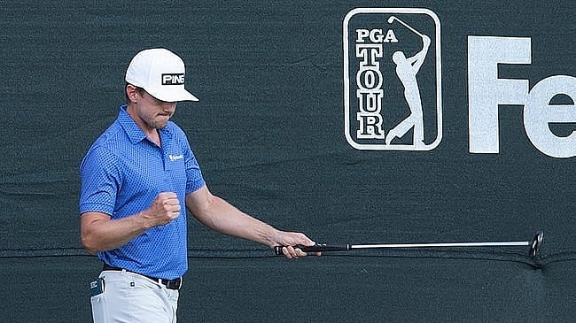 Mackenzie Hughes reacts to making his final putt of the day, finishing Round 3 at 14 under par during the Sanderson Farms Championship at the Country Club of Jackson in Jackson, Miss., Saturday, Oct. 1, 2022.
Tcl Sfc R3