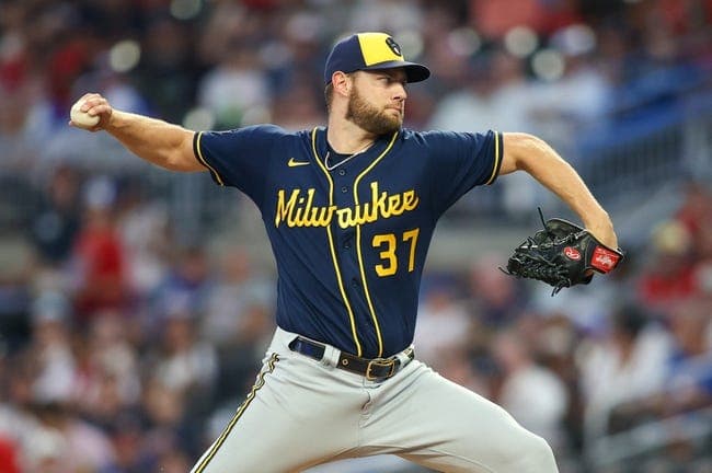 Milwaukee Brewers starting pitcher Adrian Houser throws against the Atlanta Braves in the second inning at Truist Park.