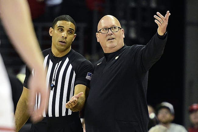 Nov 29, 2022; Madison, Wisconsin, USA;  Wake Forest Demon Deacons head coach Steve Forbes talks to a referee during the second half against the Wisconsin Badgers at the Kohl Center. Mandatory Credit: Kayla Wolf-USA TODAY Sports