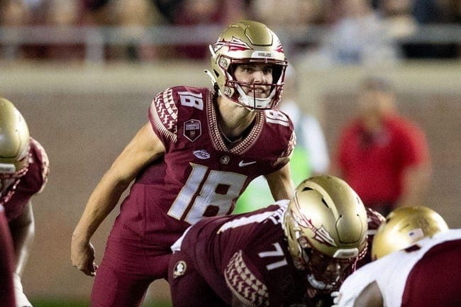Florida State Seminoles quarterback Tate Rodemaker (18) talks to his teammates. The Florida State Seminoles defeated the Boston College Eagles 44-14 at Doak Campbell Stadium on Saturday, Sept. 24, 2022.
Fsu V Boston College Second005