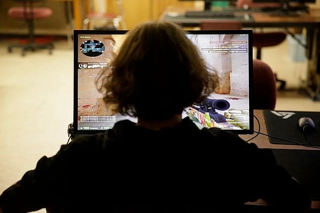 Nolan Starkey, a senior at Rossville High School, plays Counter Strike: Global Offensive, Monday, April 15, 2019, in Rossville. Starkey signed his letter of intent Wednesday to play esports at Trine University in Angola, Ind.

Rossville High School Senior Signs With Trine University To Play Esports