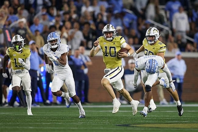 Oct 28, 2023; Atlanta, Georgia, USA; Georgia Tech Yellow Jackets quarterback Haynes King (10) runs the ball against the North Carolina Tar Heels in the second half at Bobby Dodd Stadium at Hyundai Field. Mandatory Credit: Brett Davis-USA TODAY Sports