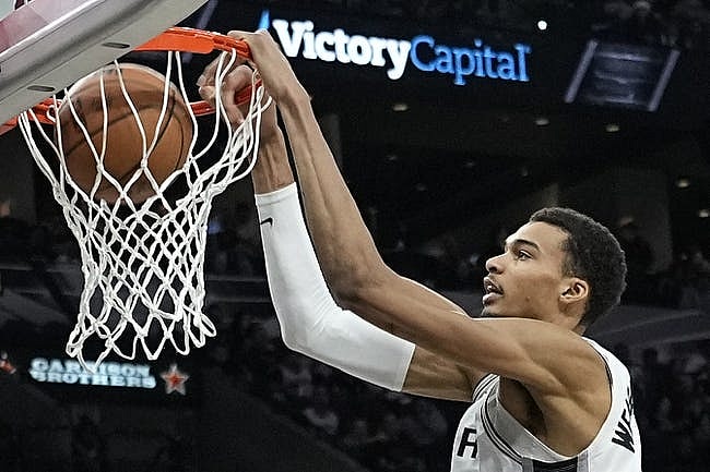Dec 17, 2023; San Antonio, Texas, USA; San Antonio Spurs forward Victor Wembanyama (1) dunks during the second half against the New Orleans Pelicans at Frost Bank Center. Mandatory Credit: Scott Wachter-USA TODAY Sports