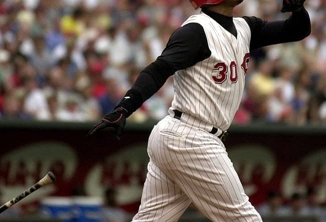 JUNE 26, 2000: Ken Griffey Jr. watches his ball fly over the fence for a 2-run home run in the first inning against the St. Louis Cardinals Monday at Cinergy Field.
Text 2000 06 26 08 02 Reds Sports Nikon Digital Image The Cincinnati Reds Ken Griffey Jr Watches His Ball Fly Over The Fence For A 2 Run Homerun Bringing In Teammate Dmitre Young In The 1st Inning Against The St Louis Cardinals Monday At Cinergy Field Jeff Swinger Cincinnati Enquirer Js