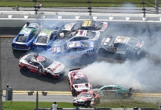 Austin Dillon (No. 3) picks his way through the mess and toward the lead after the major crash in Turns 1 and 2.
Coke 400 Dillon Sneaks