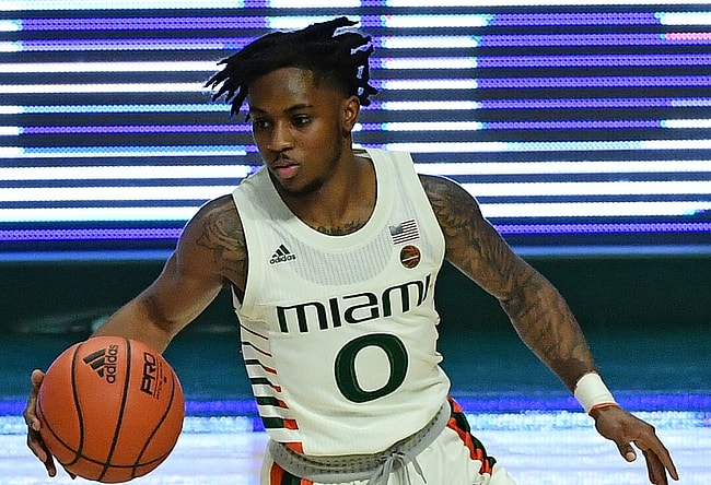 Nov 29, 2020; Coral Gables, Florida, USA; Miami Hurricanes guard Chris Lykes (0) dribbles the ball up the court against the North Florida Ospreys during the first half at Watsco Center. Mandatory Credit: Jasen Vinlove-USA TODAY Sports