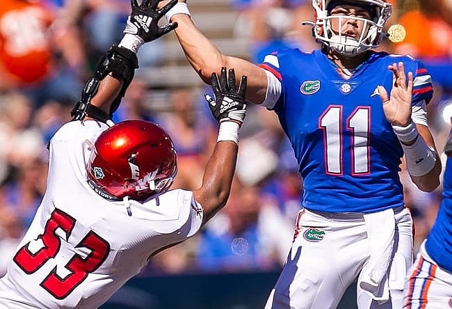Eastern Washington Eagles linebacker Elijah Rodriguez (52) gets a hand on Florida Gators quarterback Jalen Kitna (11) in the second half at Steve Spurrier Field at Ben Hill Griffin Stadium in Gainesville, FL on Sunday, October 2, 2022. [Doug Engle/Gainesville Sun]

Ncaa Football Florida Gators Vs Eastern Washington Eagles