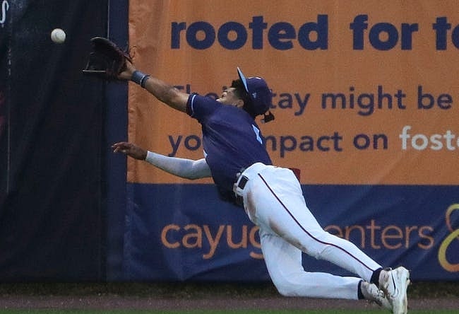 Wilmington's Daylen Lile dives but can't get to a long Renegade drive in the fourth inning of the Blue Rocks' 6-3 loss at Frawley Stadium, Friday, August 4, 2023.