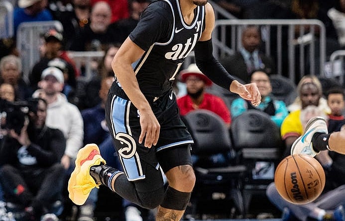 Jan 15, 2024; Atlanta, Georgia, USA; Atlanta Hawks guard Trae Young (11) dribbles down court against San Antonio Spurs during the first quarter at State Farm Arena. Mandatory Credit: Jordan Godfree-USA TODAY Sports