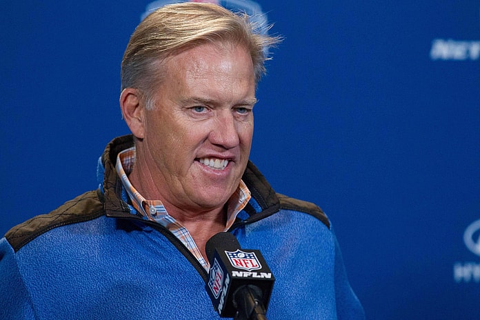 John Elway and the Broncos are looking to move up in the draft