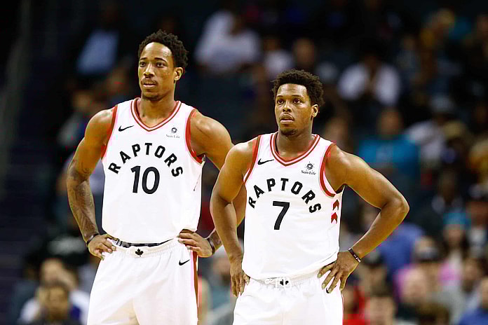 Feb 11, 2018; Charlotte, NC, USA; Toronto Raptors guard Kyle Lowry (7) and guard DeMar DeRozan (10) stands on the court in the first half against the Charlotte Hornets at Spectrum Center. Mandatory Credit: Jeremy Brevard-USA TODAY Sports