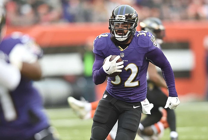 Ravens safety Eric Weddle intercepts a pass