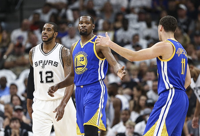 May 20, 2017; San Antonio, TX, USA; Golden State Warriors forward Kevin Durant (35) celebrates with guard Klay Thompson (11) after a play during the first quarter against the San Antonio Spurs in game three of the Western conference finals of the NBA Playoffs at AT&T Center. Mandatory Credit: Troy Taormina-USA TODAY Sports