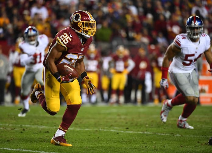 Jan 1, 2017; Landover, MD, USA; Washington Redskins running back Chris Thompson (25) rushes the ball against the New York Giants during the second half at FedEx Field. Mandatory Credit: Brad Mills-USA TODAY Sports
