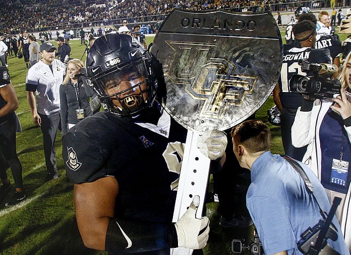 UCF Knights celebrate win over South Florida on Black Friday