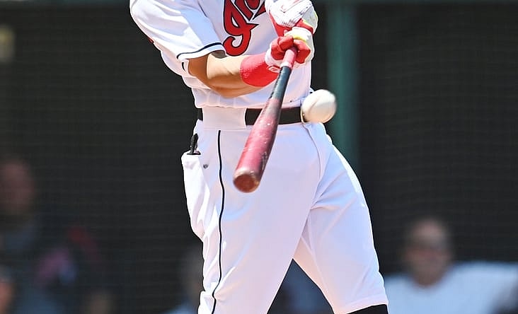 Jul 25, 2021; Cleveland, Ohio, USA; Cleveland Indians second baseman Cesar Hernandez (7) hits a home run during the first inning against the Tampa Bay Rays at Progressive Field. Mandatory Credit: Ken Blaze-USA TODAY Sports