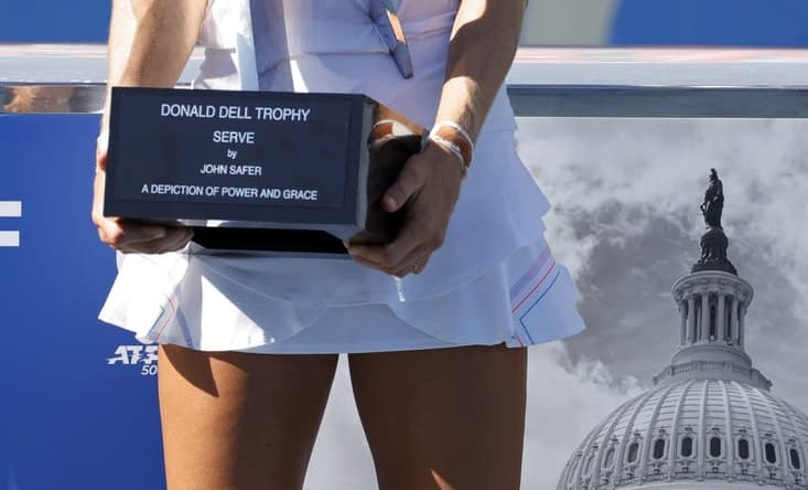 Aug 7, 2022; Washington, DC, USA; Liudmila Samsonova celebrates with the championship trophy after her match against Kaia Kanepi (EST) (not pictured) in the women's singles final on day seven of the Citi Open at Rock Creek Park Tennis Center. Mandatory Credit: Geoff Burke-USA TODAY Sports