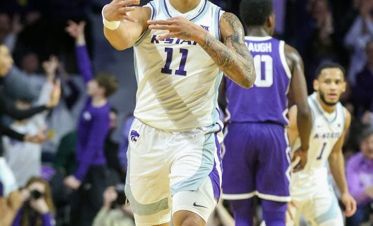 Feb 7, 2023; Manhattan, Kansas, USA; Kansas State Wildcats guard Keyontae Johnson (11) celebrates making a three-point basket during the second half against the TCU Horned Frogs at Bramlage Coliseum. Mandatory Credit: Scott Sewell-USA TODAY Sports