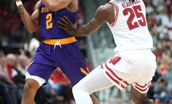 Nov 27, 2023; Madison, Wisconsin, USA;  Western Illinois Leathernecks guard Ryan Myers (2) looks to pass the ball while defended by Wisconsin Badgers guard John Blackwell (25) during the first half at the Kohl Center. Mandatory Credit: Kayla Wolf-USA TODAY Sports