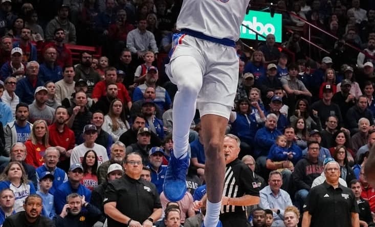 Dec 5, 2023; Lawrence, Kansas, USA; Kansas Jayhawks guard Kevin McCullar Jr. (15) shoots a layup against the UMKC Kangaroos during the first half at Allen Fieldhouse. Mandatory Credit: Denny Medley-USA TODAY Sports
