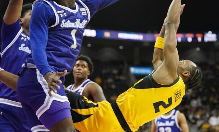 Dec 17, 2023; Kansas City, Missouri, USA; Missouri Tigers guard Tamar Bates (2) shoots as Seton Hall Pirates guard Kadary Richmond (1) tries to block during the first half at T-Mobile Center. Mandatory Credit: Denny Medley-USA TODAY Sports