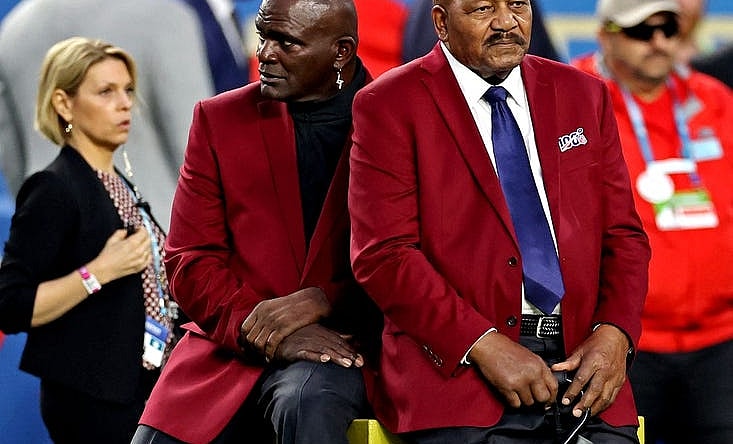 Feb 2, 2020; Miami Gardens, Florida, USA; NFL 100 All-Time Team members Lawrence Taylor and Jim Brown before Super Bowl LIV between the San Francisco 49ers and the Kansas City Chiefs at Hard Rock Stadium. Mandatory Credit: Matthew Emmons-USA TODAY Sports