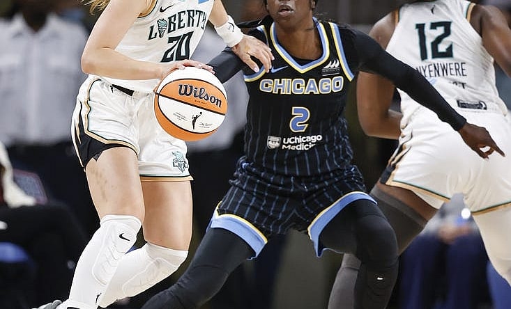 Aug 20, 2022; Chicago, Illinois, USA; New York Liberty guard Sabrina Ionescu (20) drives to the basket against Chicago Sky guard Kahleah Copper (2) during the first half of Game 2 of the first round of the WNBA playoffs at Wintrust Arena. Mandatory Credit: Kamil Krzaczynski-USA TODAY Sports