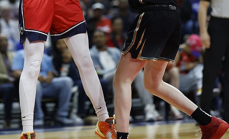 May 19, 2023; Washington, District of Columbia, USA; Washington Mystics forward Elena Delle Donne (11) shoots the ball as New York Liberty forward Breanna Stewart (30) defends at Entertainment & Sports Arena. Mandatory Credit: Geoff Burke-USA TODAY Sports