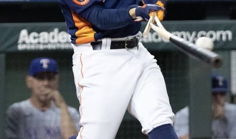 Jul 26, 2023; Houston, Texas, USA;  Houston Astros second baseman Jose Altuve (27) breaks his bat on a foul ball against the Texas Rangers in the third inning at Minute Maid Park. Mandatory Credit: Thomas Shea-USA TODAY Sports