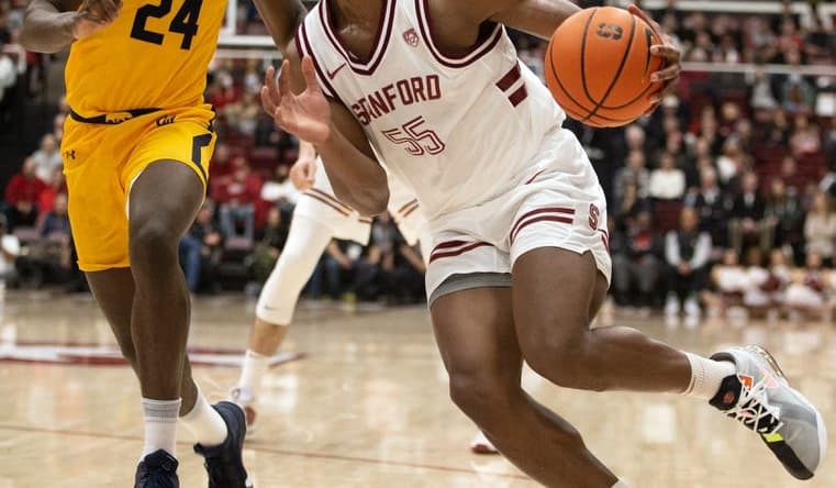Jan 28, 2023; Stanford, California, USA; Stanford Cardinal forward Harrison Ingram (55) drives past California Golden Bears forward Sam Alajiki (24) during the first half at Maples Pavilion. Mandatory Credit: D. Ross Cameron-USA TODAY Sports