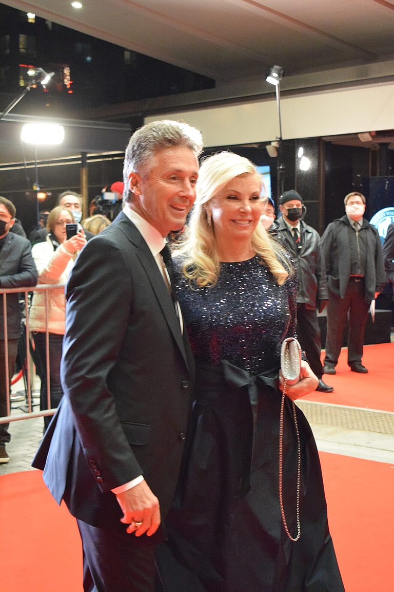 Doug Wilson and his wife on the Hockey Hall of Fame induction ceremony red carpet